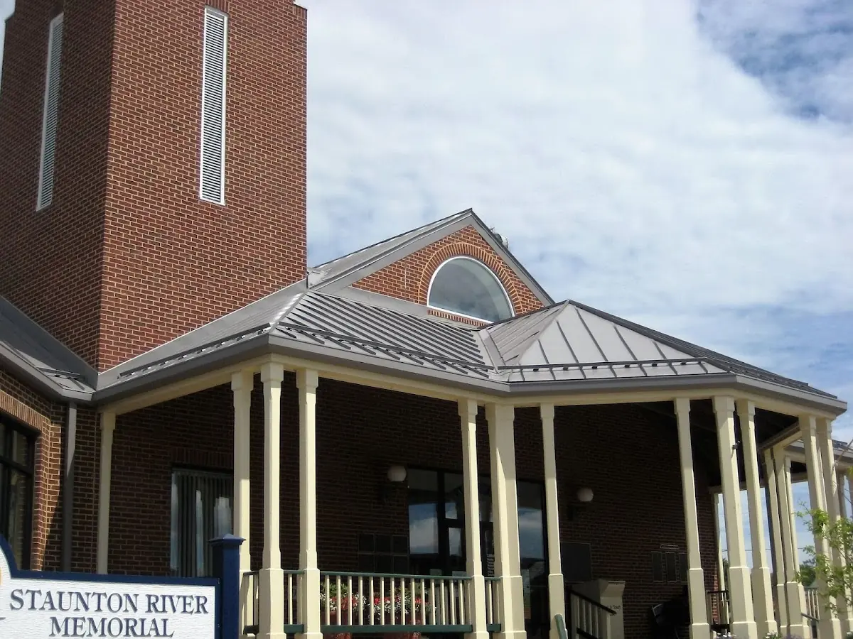Skilled roofing craftsmen working on a residential roof in Taylor